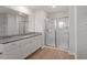 Bathroom featuring white vanity, granite countertop, and glass-enclosed shower at 103 Shelfit Trl, Oxford, NC 27565