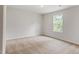 Bedroom featuring plush carpet and a bright window at 103 Shelfit Trl, Oxford, NC 27565