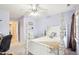 Bright bedroom features a bed frame with posts and lots of natural light at 104 Barnes Spring Ct, Cary, NC 27519