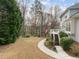 Spacious backyard with a deck, and an American flag, perfect for outdoor entertaining and relaxation at 105 Aberson Ct, Cary, NC 27519