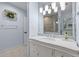 Bathroom with a white sink with marble countertop and light blue walls at 105 Aberson Ct, Cary, NC 27519