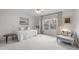 Bright bedroom features a ceiling fan, and natural light at 105 Aberson Ct, Cary, NC 27519