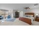 Spacious bedroom with a large bed, ample natural light, and comfortable furnishings at 105 Aberson Ct, Cary, NC 27519