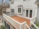 A spacious wooden deck overlooking the backyard, perfect for outdoor dining and entertainment at 105 Aberson Ct, Cary, NC 27519