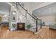 Elegant foyer with a grand staircase, hardwood floors, and decorative accents at 105 Aberson Ct, Cary, NC 27519