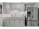 Modern kitchen with stainless steel refrigerator and plenty of cabinet space at 105 Aberson Ct, Cary, NC 27519