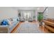 Bright and airy living room with hardwood floors and stylish furniture at 105 Aberson Ct, Cary, NC 27519