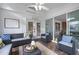 Inviting sunroom with comfortable seating and sliding glass doors, perfect for relaxation and entertainment at 105 Aberson Ct, Cary, NC 27519