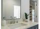 Bathroom vanity with elegant fixtures and a neutral color scheme at 109 W Markham Ave, Durham, NC 27701