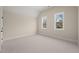 Bedroom featuring carpet floors, neutral walls and natural light at 109 W Markham Ave, Durham, NC 27701