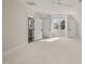 Bedroom featuring large windows, ceiling fan, and carpet floors at 109 W Markham Ave, Durham, NC 27701