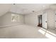 Bedroom featuring large window, ceiling fan, and carpet floors at 109 W Markham Ave, Durham, NC 27701