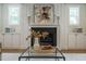 Elegant fireplace with mantle and built-in cabinets at 109 W Markham Ave, Durham, NC 27701