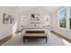 Cozy main bedroom features neutral tones, vaulted ceilings, and natural light at 109 W Markham Ave, Durham, NC 27701