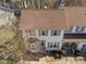 Aerial view of a two-story home with light siding, gray shutters, and a well-maintained front yard at 12 Citation Dr, Durham, NC 27713