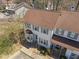 Aerial view of a two-story home with light siding, gray shutters, and a well-maintained front yard at 12 Citation Dr, Durham, NC 27713