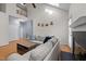 Vaulted living room with a fireplace and hardwood floors, open to the second story at 12 Citation Dr, Durham, NC 27713