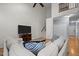 Bright living room featuring hardwood floors and a vaulted ceiling at 12 Citation Dr, Durham, NC 27713