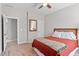 Large bedroom with a ceiling fan, bed, mirror and great lighting at 1328 Mill Glen Cir, Raleigh, NC 27614