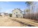 Back yard of home featuring screened porch and large backyard at 1328 Mill Glen Cir, Raleigh, NC 27614