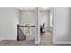 Upstairs landing area leads into a cozy home office with natural light at 1328 Mill Glen Cir, Raleigh, NC 27614