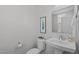 Powder room offers a pedestal sink, and charming decor at 1329 Channing Park Cir, Cary, NC 27519