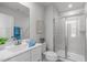 Bathroom with a glass shower, framed mirror, and white vanity at 1329 Channing Park Cir, Cary, NC 27519