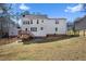Home exterior and sprawling backyard featuring a well-manicured lawn at 15 Rocky Point Ct, Fuquay Varina, NC 27526