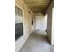Covered patio with neutral siding and concrete flooring at 151 Schultz St # 151, Chapel Hill, NC 27514