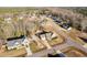 Aerial view of the property showcasing the house, driveway, lawn, and neighborhood at 16 Eagle Swoop St, Zebulon, NC 27597
