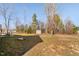 Large backyard features a storage shed, patio, and plenty of yard space at 16 Eagle Swoop St, Zebulon, NC 27597