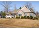 Charming one-story home features well-kept landscape, attached garage and inviting covered front porch at 16 Eagle Swoop St, Zebulon, NC 27597