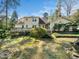 Spacious backyard featuring a lovely garden and patio, great for outdoor relaxation and activities at 1708 Lakepark Dr, Raleigh, NC 27612