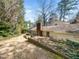 A backyard with a chimney and an area for gardening at 1708 Lakepark Dr, Raleigh, NC 27612