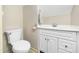 Clean and functional half bath with white vanity and fixtures at 1708 Lakepark Dr, Raleigh, NC 27612