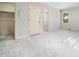 Spacious bedroom with neutral carpet, light walls, and bright windows offering natural light at 1708 Lakepark Dr, Raleigh, NC 27612
