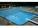 A large community pool with diving boards and lane markers at 1708 Lakepark Dr, Raleigh, NC 27612