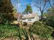 Charming home with lush landscaping and a well-maintained front yard, creating inviting curb appeal at 1708 Lakepark Dr, Raleigh, NC 27612