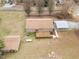 Large lot with outbuilding, detached garage, and wood deck, showcasing the property's appeal at 1723 Bahama Rd, Bahama, NC 27503