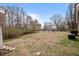 Expansive backyard with ample green space, offering potential for various outdoor activities at 1723 Bahama Rd, Bahama, NC 27503