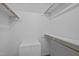 Bright, clean walk-in closet with basic shelving, ready for storage solutions at 1723 Bahama Rd, Bahama, NC 27503