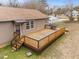 Spacious wooden deck accessible from the home, ideal for entertaining or outdoor relaxation at 1723 Bahama Rd, Bahama, NC 27503