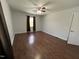 Bedroom showcasing hardwood floors, neutral walls, and a cozy ambiance at 1816 Phillips Dr, Sanford, NC 27330