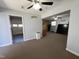 This bonus room offers carpeted floors, neutral walls, and flexible space, plus garage and backyard access at 1816 Phillips Dr, Sanford, NC 27330