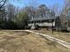 This traditional home boasts a spacious front yard and a long driveway leading to a welcoming entrance at 1816 Phillips Dr, Sanford, NC 27330