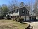 Charming two-story home with brick accents, double garage, and a beautifully landscaped front yard at 1816 Phillips Dr, Sanford, NC 27330