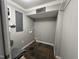 Functional laundry room with slate tile flooring and neutral paint at 1816 Phillips Dr, Sanford, NC 27330