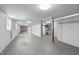 Expansive unfinished basement area offering ample space for storage or future renovation with access to the garage at 1900 Sunset Ave, Durham, NC 27705