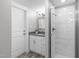 This bathroom features a tiled shower and a modern vanity at 1900 Sunset Ave, Durham, NC 27705