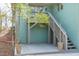 Cozy home exterior showcasing a wooden deck and stairs, perfect for outdoor living and entertaining at 1900 Sunset Ave, Durham, NC 27705